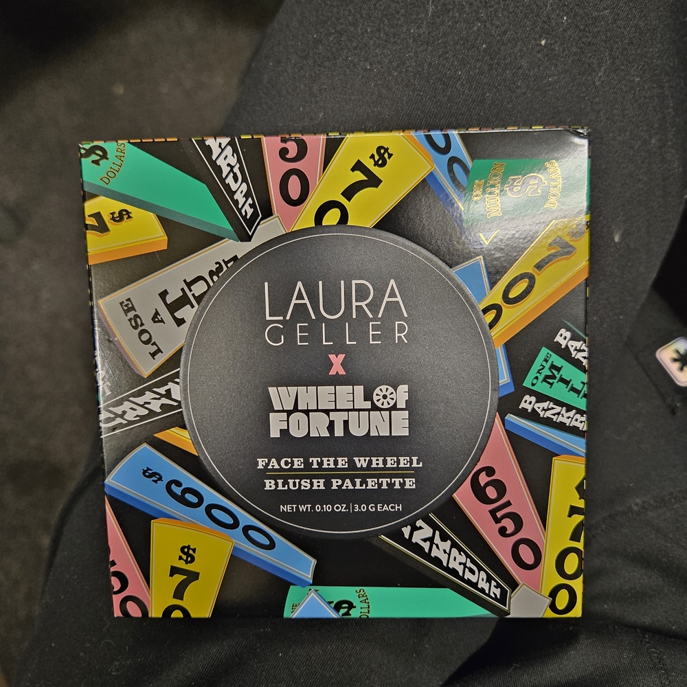 Laura Geller Black Wheel of Fortune Compact